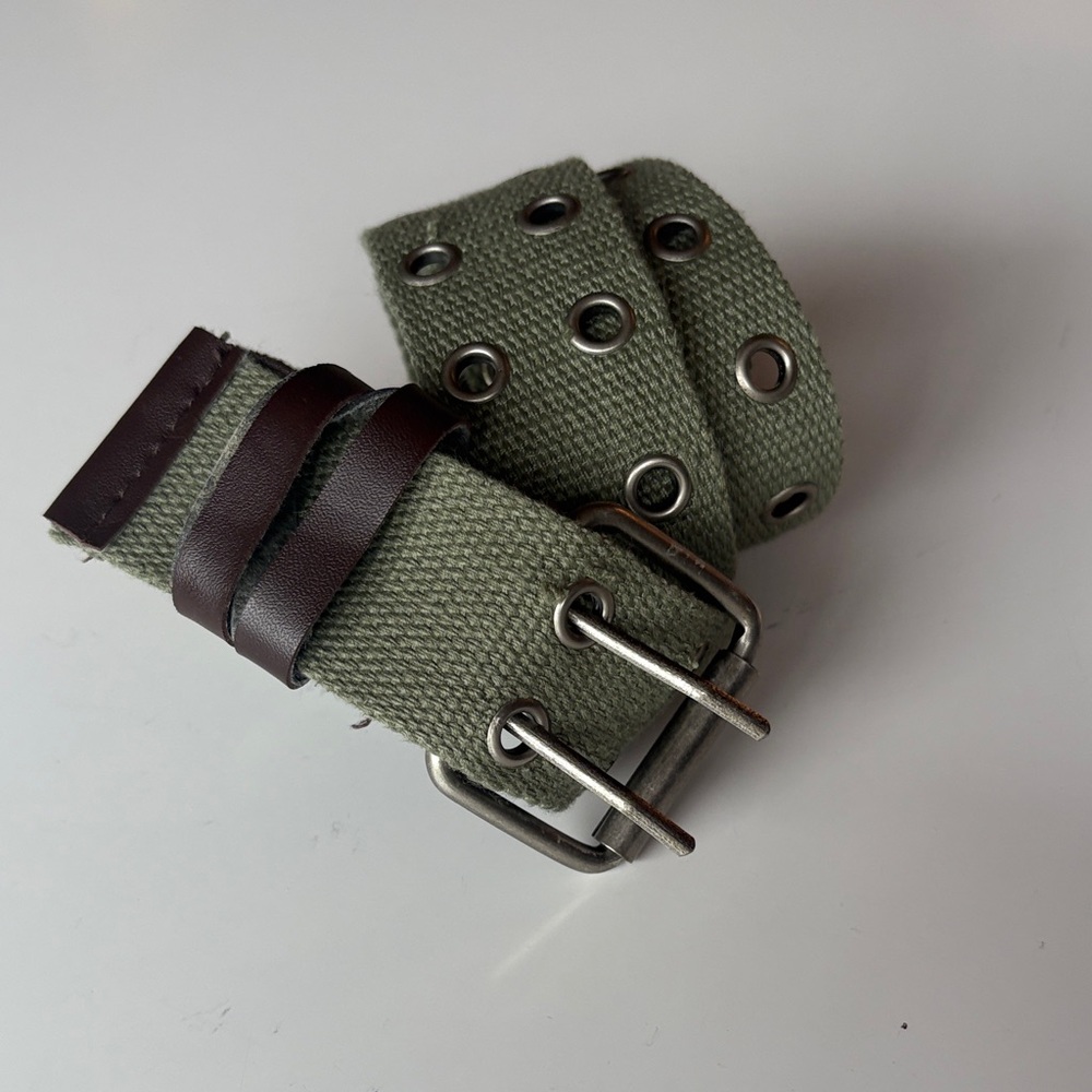 Olive Green Canvas Belt with brown accents. Silver tone hook loops. 30 waist
